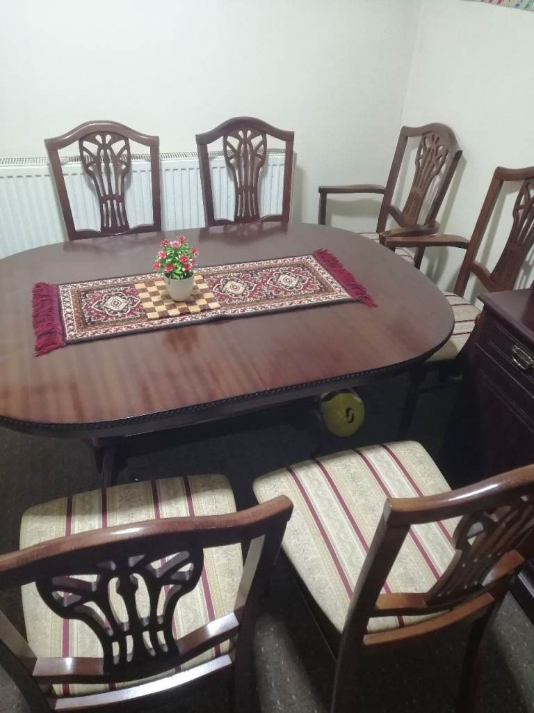 Wooden Dining table and 6 chairs
