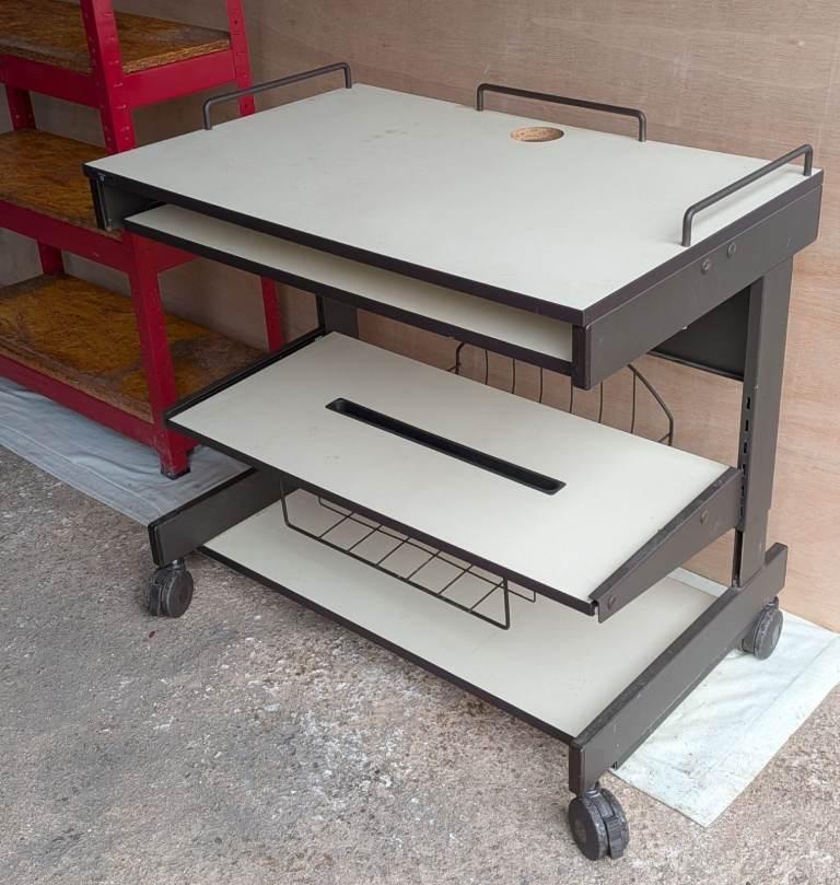 Computer Desk on Castors (67cm - 80cm adjustable height x 85cm wide x 55cm deep).