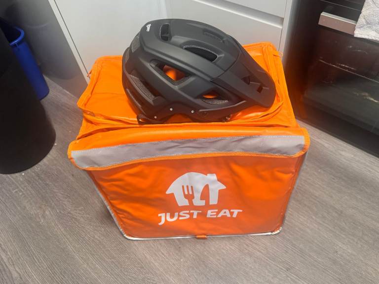 Just Eat bag, medium SpartanPac bag and a helmet