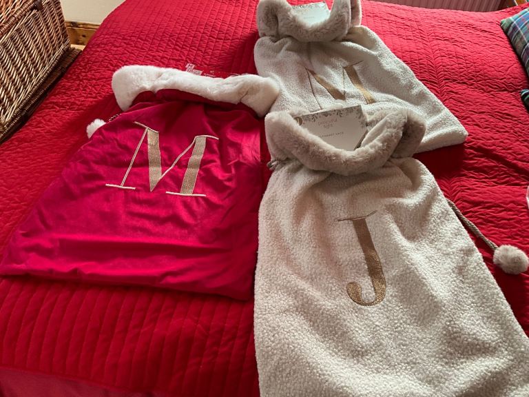 BRAND NEW WITH TAGS, XL, Santa sacks. Selling for  half price thanks 🙏 