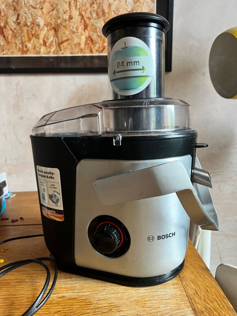 Bosch Juicer- works perfectly, small hole in lid 