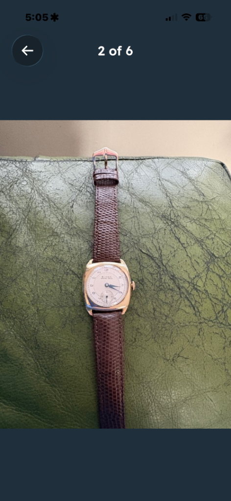 Gents gold watch 