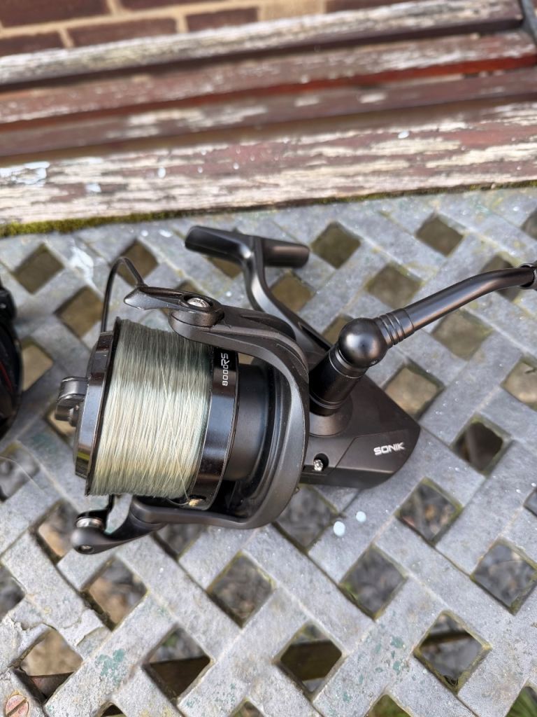 SONIK Fishing Reel – Black, Good Condition