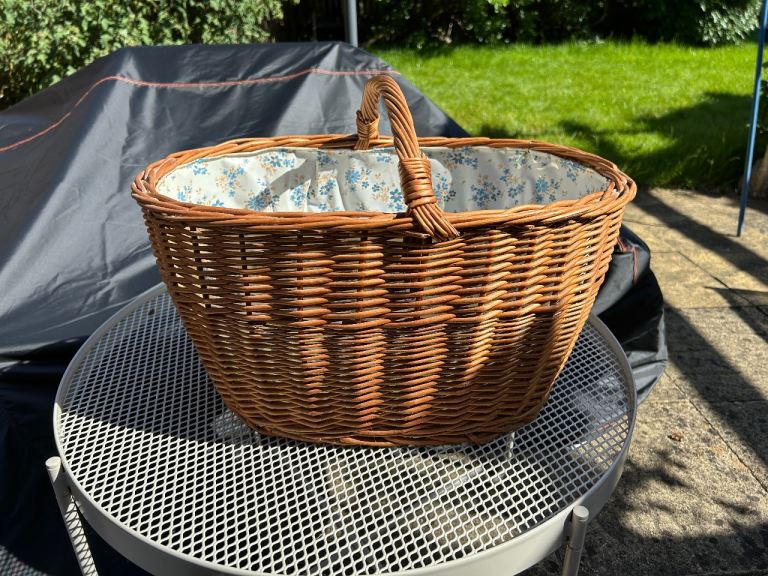 Large wicker basket with floral lining 
