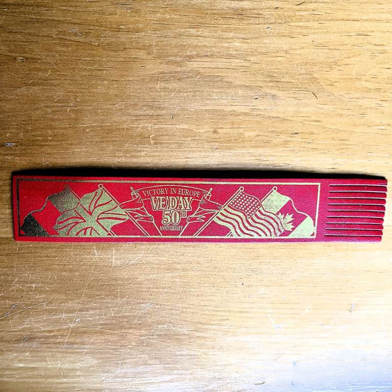 Vintage 1995 bookmark: VE Day 50 Anniversary. Faux red leather, gold-coloured detailing.