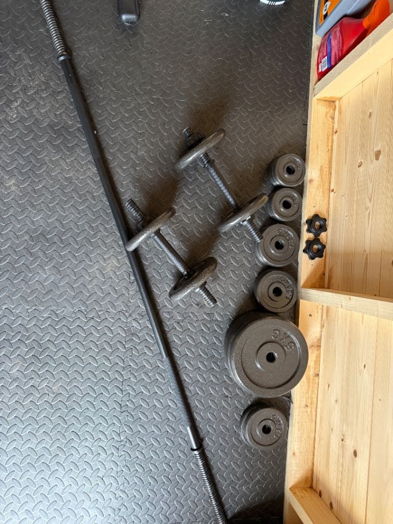 Cast iron weight set barbell and dumbbells