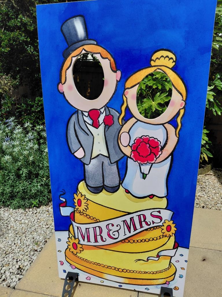 Photo Cut Out Board - Bride and Groom Face in the Hole