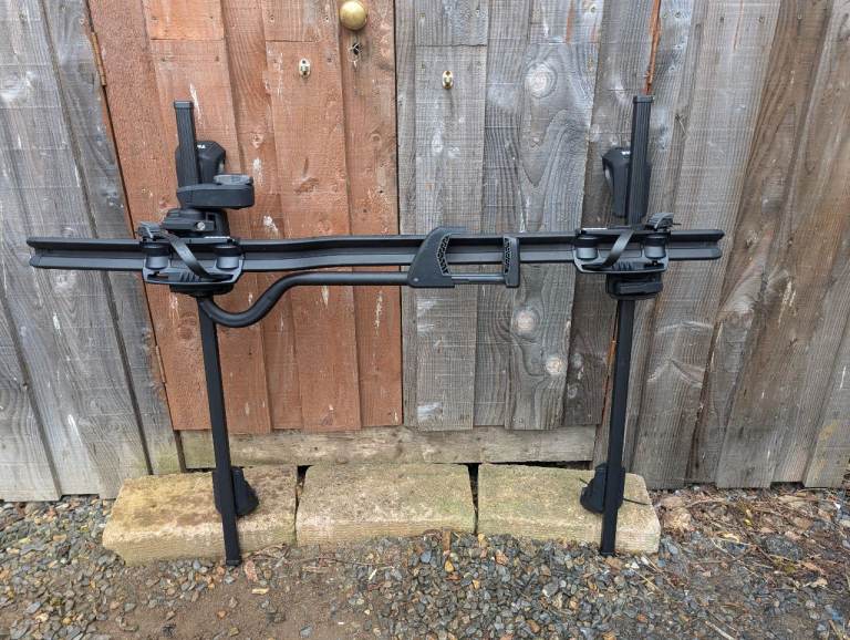 Thule roof rack & Thule bike carrier (holds the frame type bike carrier)