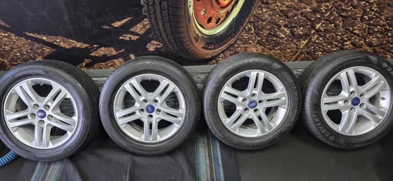 Ford Genuine 16 alloy wheels + 4 x tyres 215 55 16 Hankook