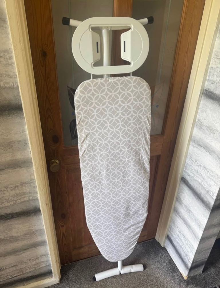 White Ironing Board with Grey Patterned Cover – Good Condition