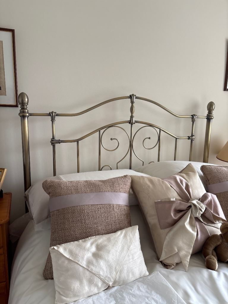 Antique brass headboard