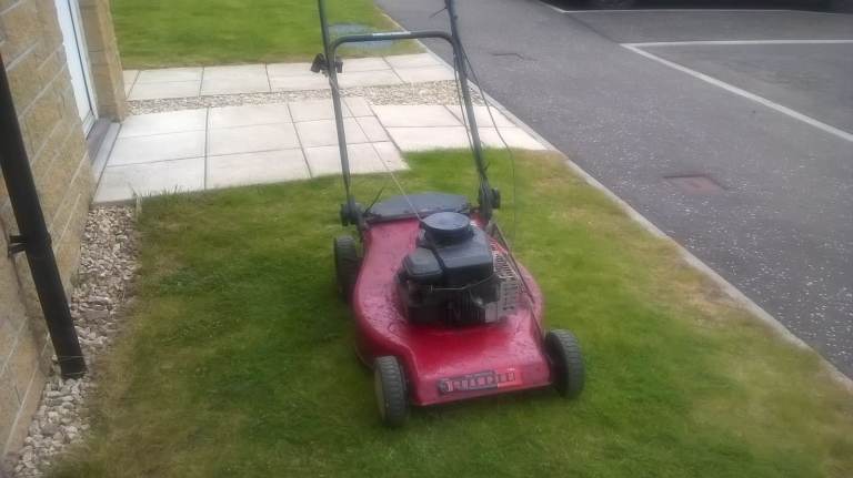 Champion petrol lawnmower