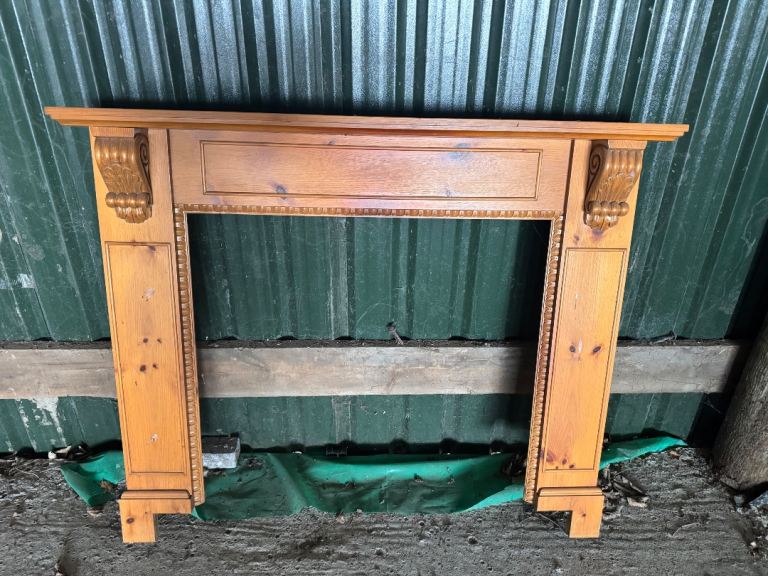 Solid Wood Fireplace Surround with Carved Details – Good Condition