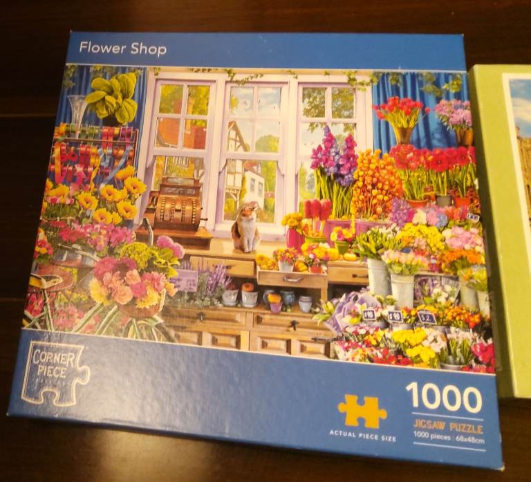 2 1000 piece jigsaws  Corner Piece Flower shop£3, 1940s High Street, bygone time
