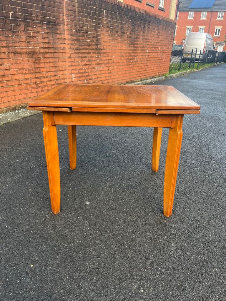 Lebus extending teak dining table (delivery available)
