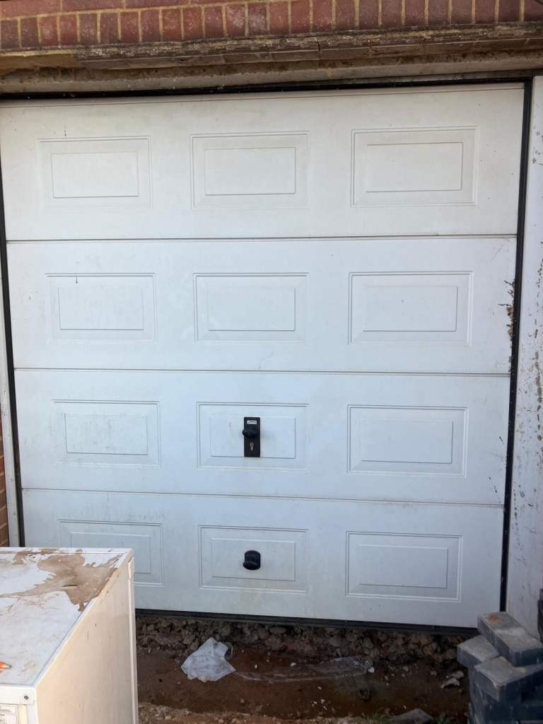 Sectional garage door