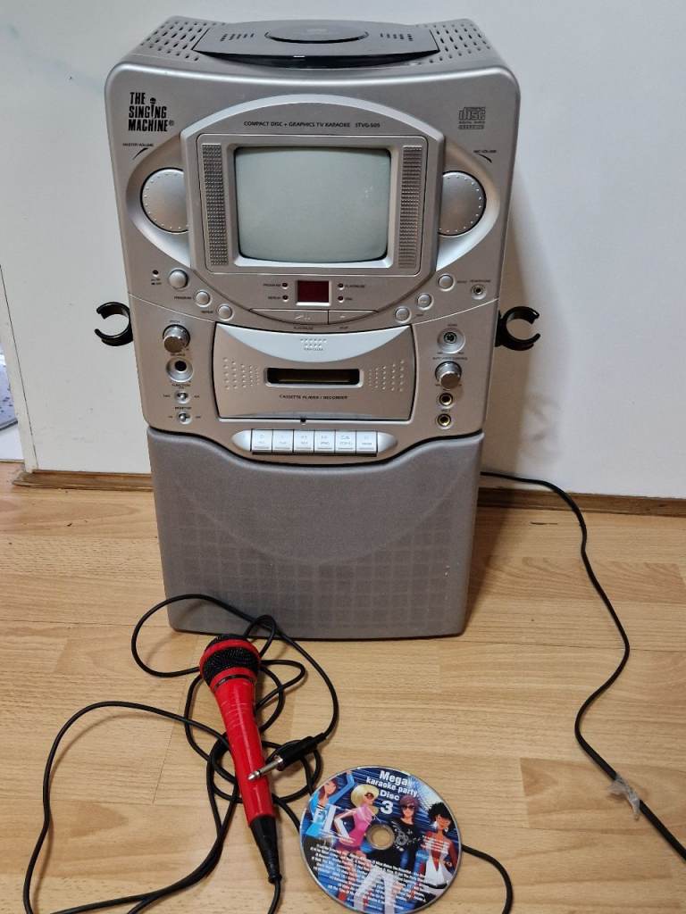 The Singing Karaoke Machine STVG-505 with Graphics TV Screen CD Tape Music Player