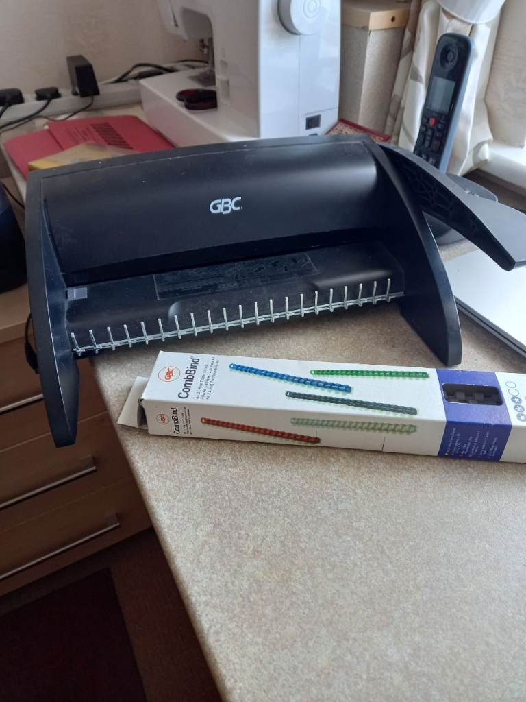 PAPER BINDING MACHINE