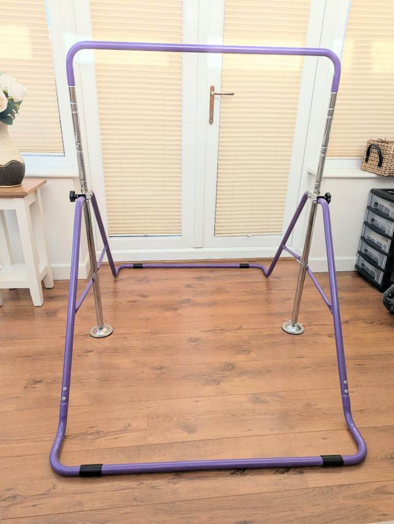 Childs adjustable gymnastics bar and beam 