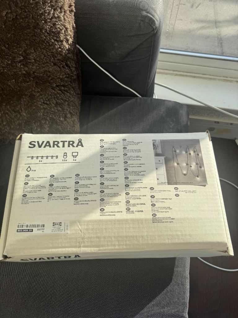 IKEA SVATRA LED string light with 12 lights 8.4 m, black/outdoor