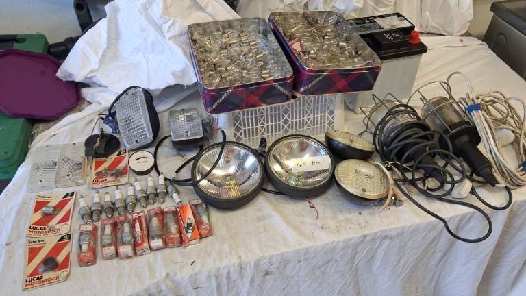 Car parts assorted spotlights, spark plugs, bulbs etc.