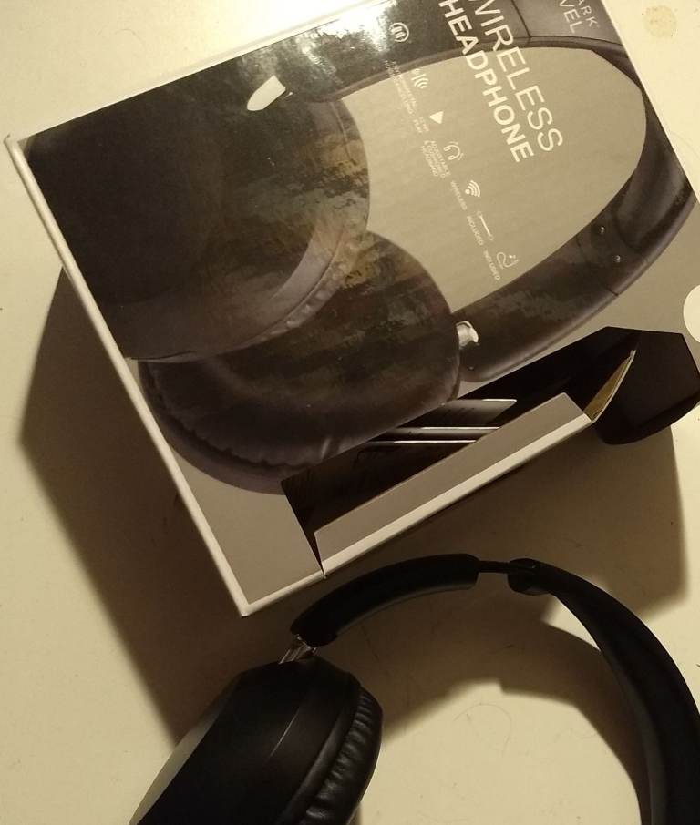 Wireless or wired headphones. NEW boxed. Foldable design. 12 hour play