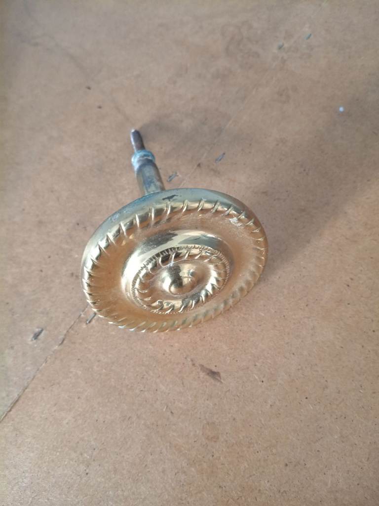 Metal curtain holdback, free to collect.