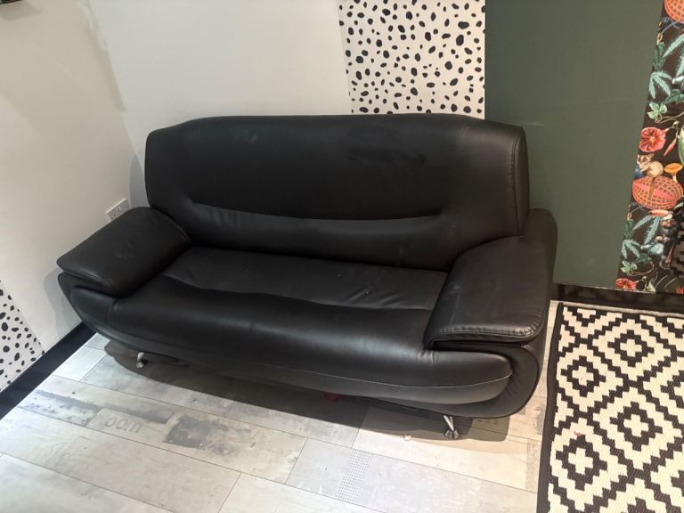 Black faux leather sofa 
