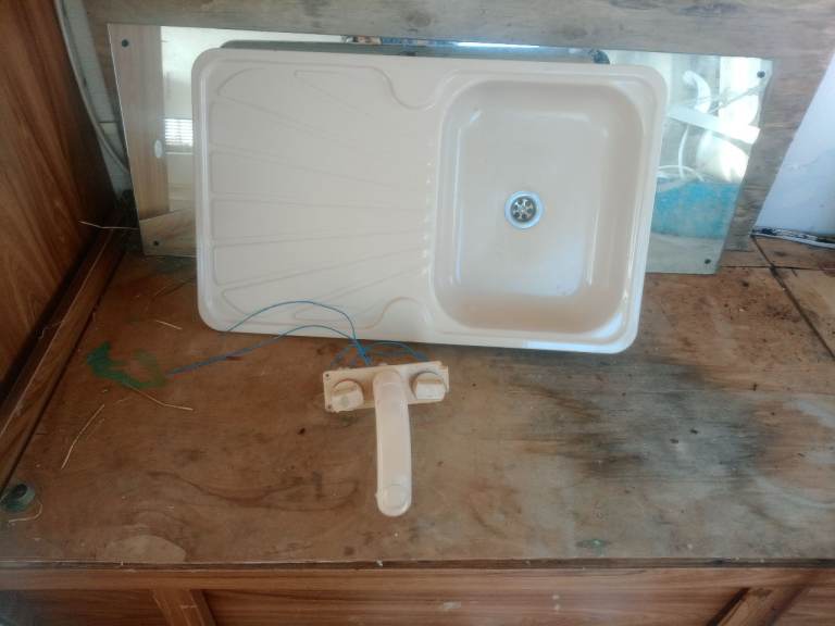 Caravan kitchen sink and drainer with hot and cold tapes