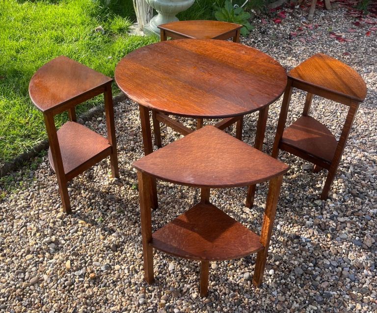 Round oak coffee table with four inset smaller tables.Circa 1920/30s