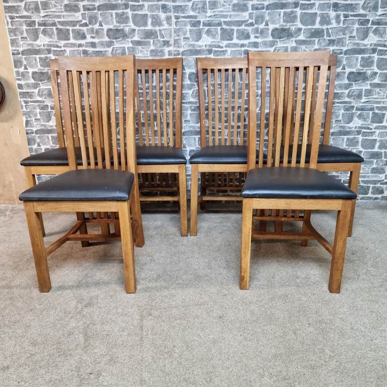 Set of 6 Oak Dining Chairs with Black Faux Leather Seats