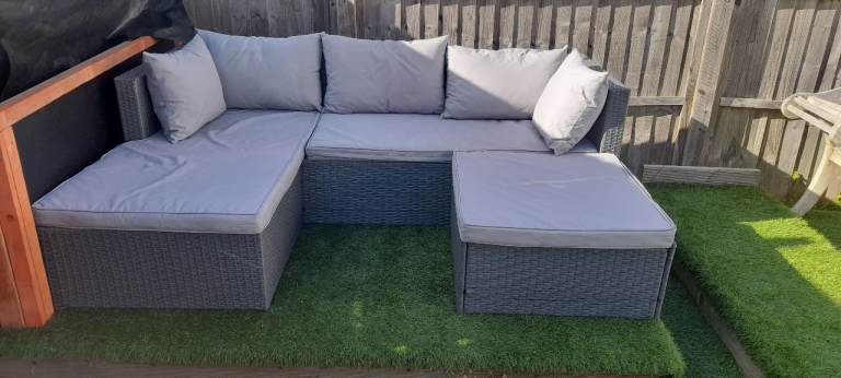 Grey Rattan sofa set with cushions very good condition 