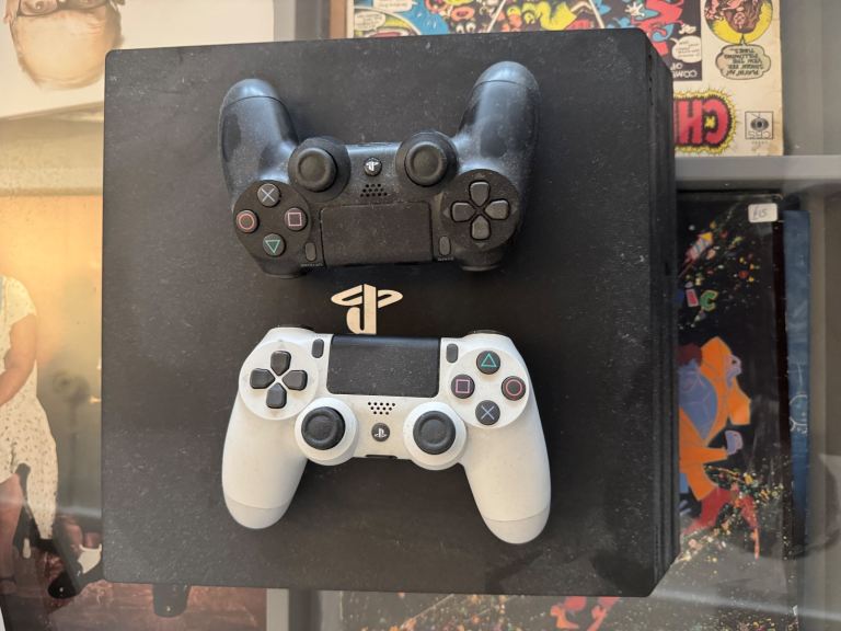 PS4 Pro 1TB with Two Controllers – Excellent Condition