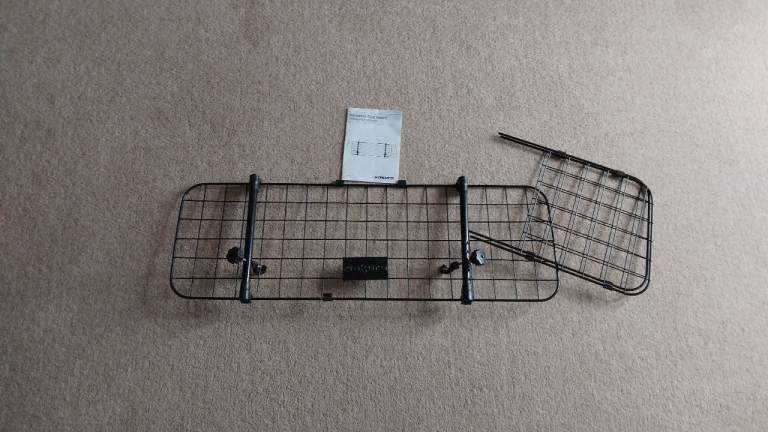 Safety car guard for dogs- attaches to headrest-adjustable.