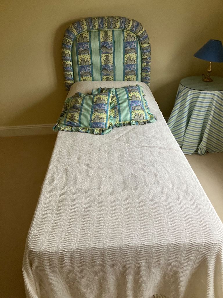 Comfortable Single Bed with Colourful Upholstered Headboard