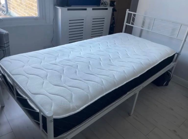 White metal single bed and mattress 