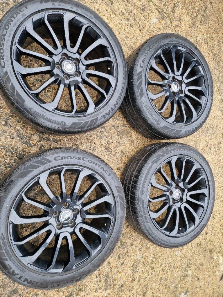 4x 275/45R22 Continental tyres on cracked alloy wheels for Range Rover