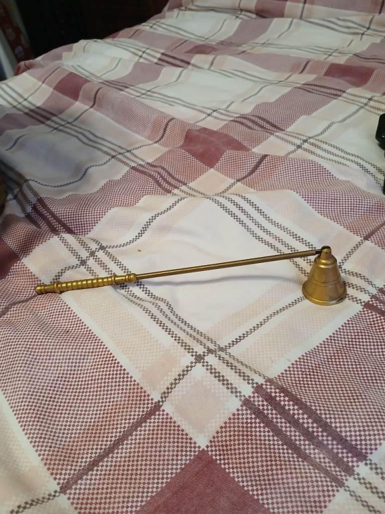Small brass candle snuffer