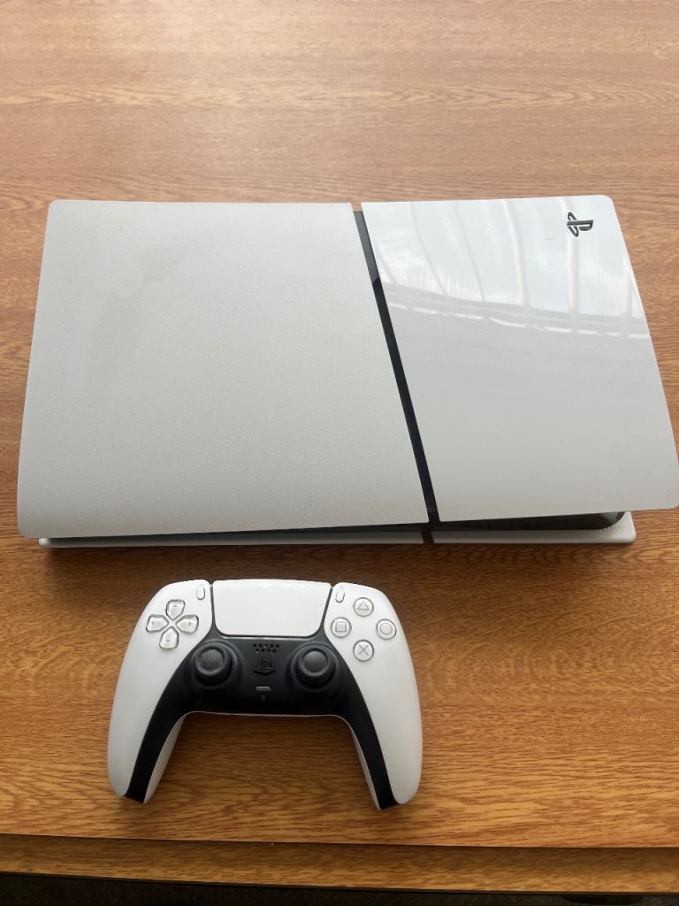 Sony PlayStation 5 Console with Two Controllers and Travel Case