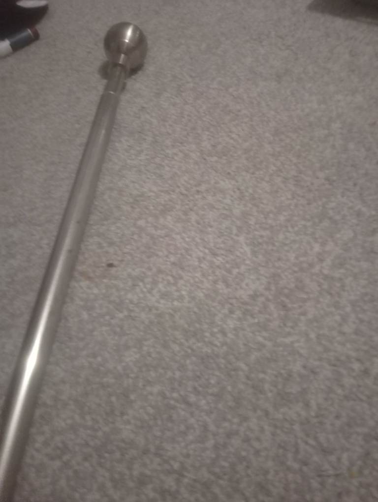 Extended curtain pole 