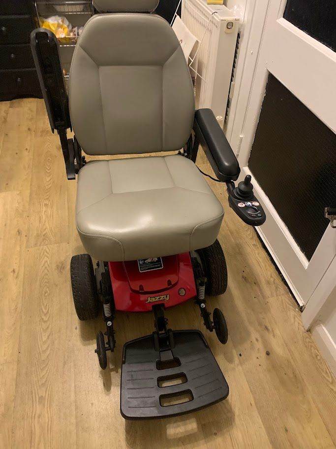 Jazzy Pride Electric wheelchair with brand new batteries and charger 