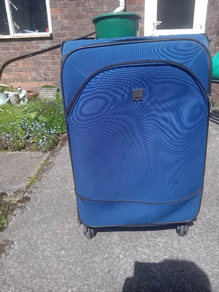 Blue Tripp Large Suitcase – Good Condition Luggage with Wheels