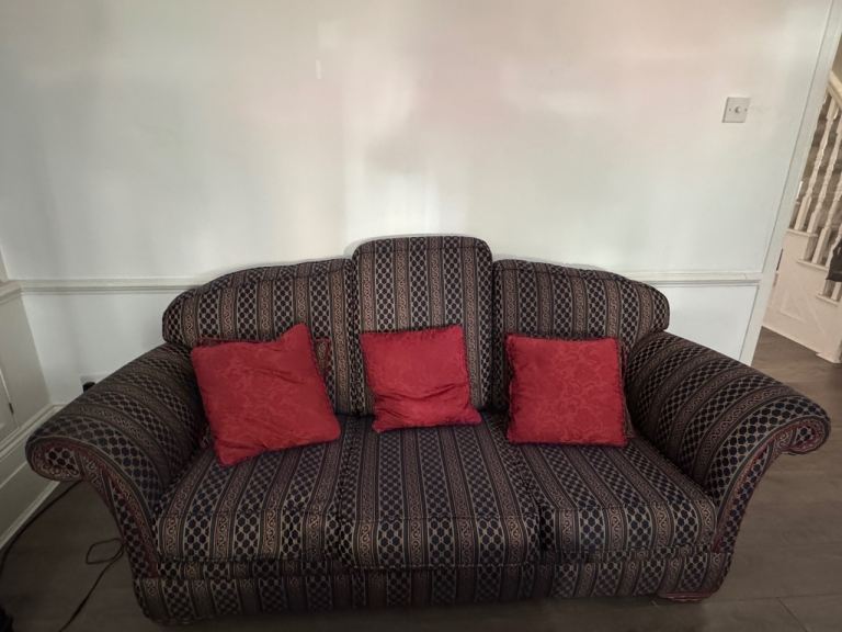 Comfortable 3-Seater Sofa with Red Cushions – Good Condition