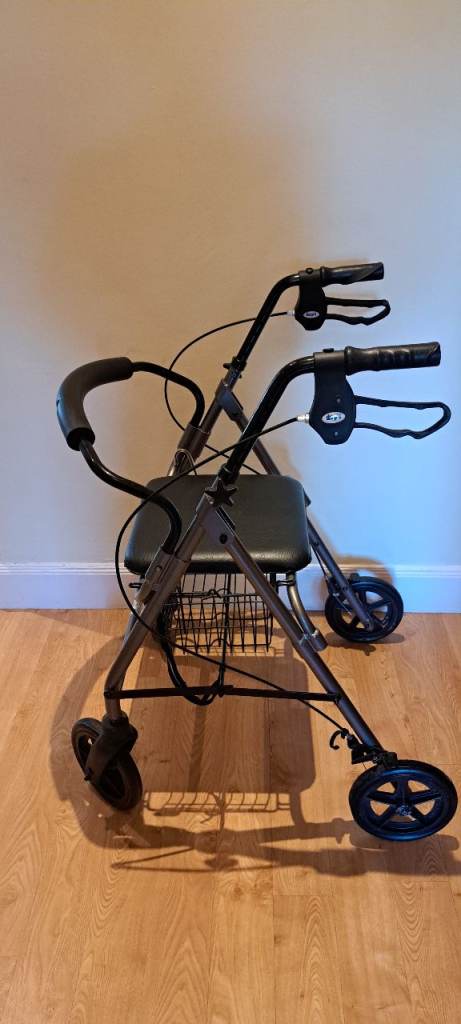 Days Four-Wheeled Mobility Walker with Seat & Basket – Needs One Wheel to run soother