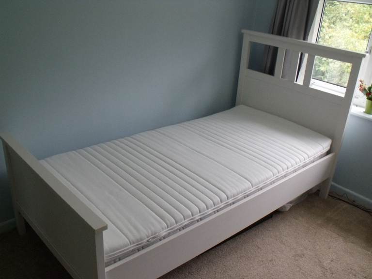An IKEA HEMNES single bed frame in white and matching Ikea Malvik foam mattress 