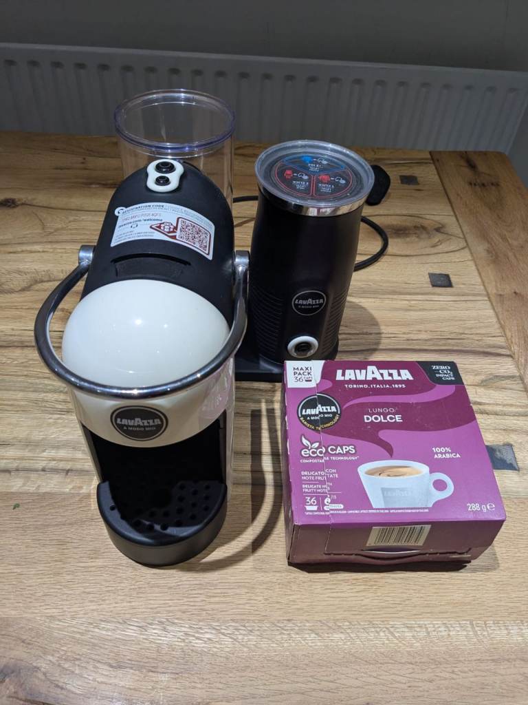 Lavazza coffee machine with milk frother & pods