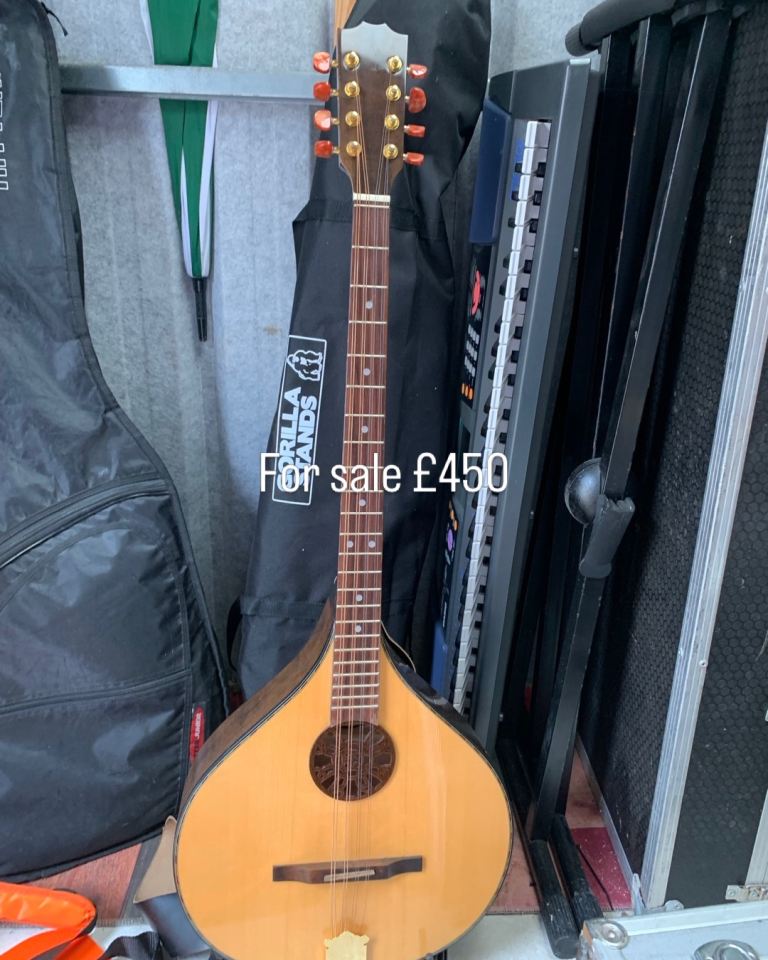Bazooki less than year old as in New condition Wooden Finish