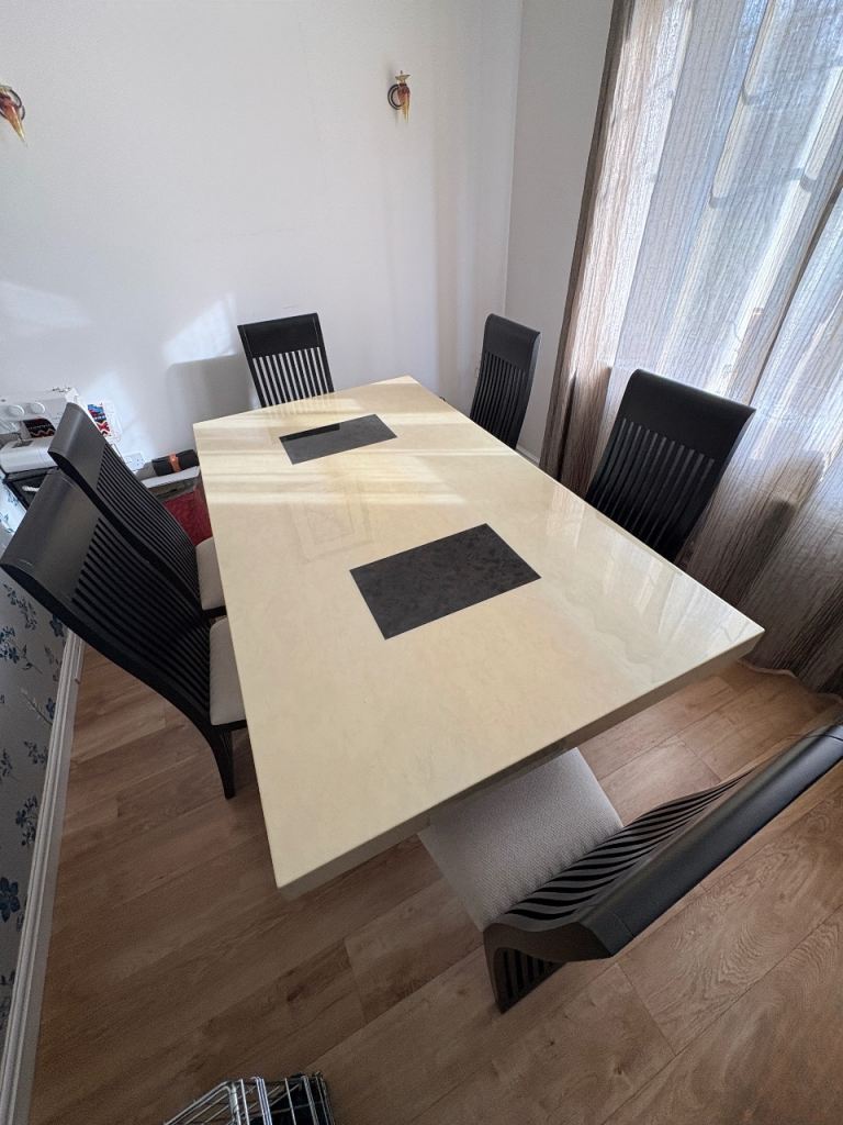 Solid polished cream marble / dark marble dining table + six chairs.