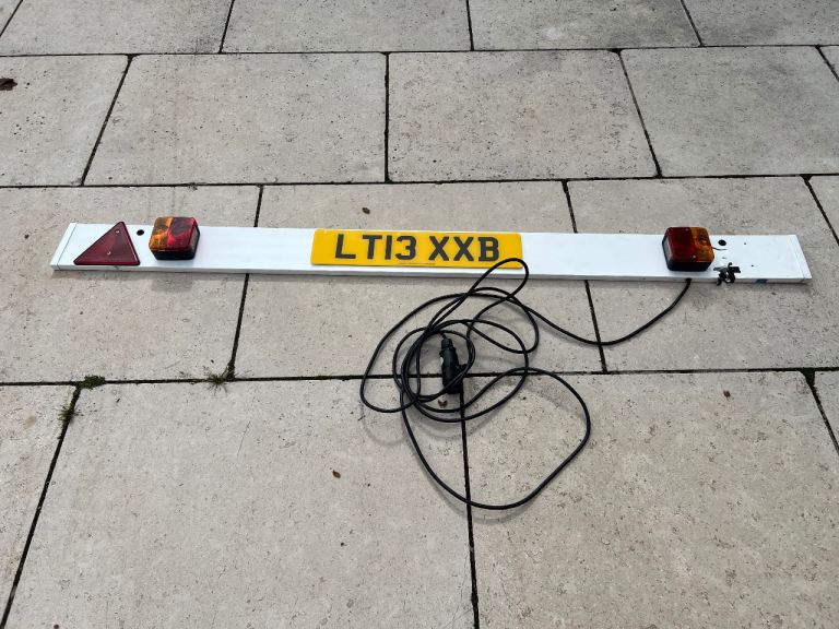 Trailer number plate board