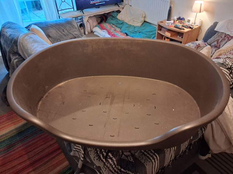 Large plastic dog bed